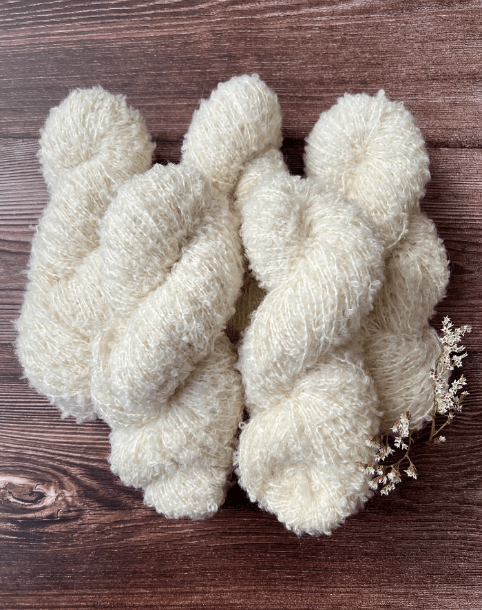 Bouclé Merinould 500 g = 5 fed