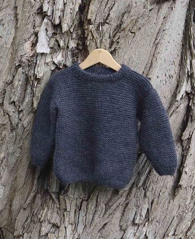 Opskrift på nem børnebluse strikket i ret på alle pinde sweater til born